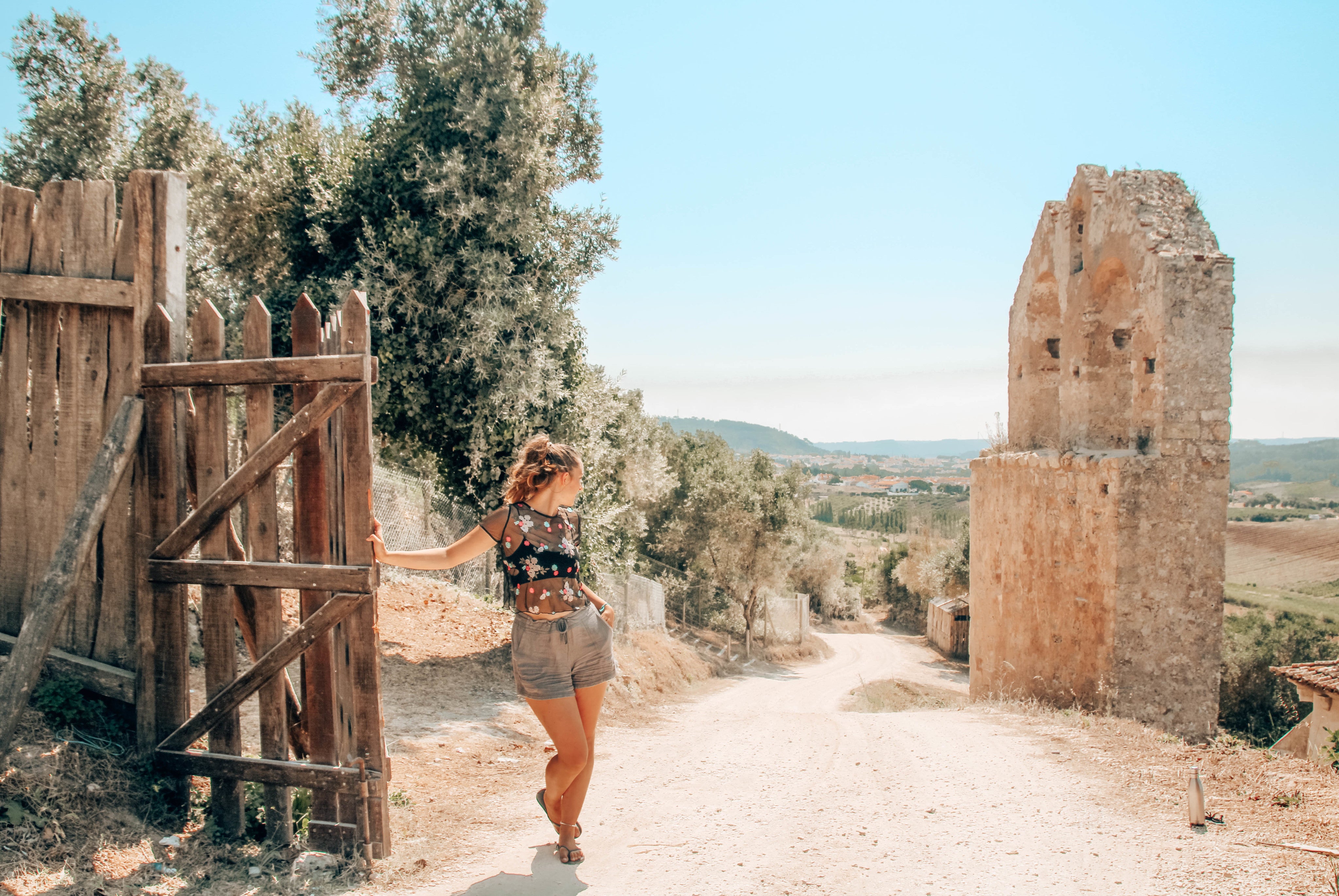 files/woman-rests-on-a-long-walk-through-countryside.jpg